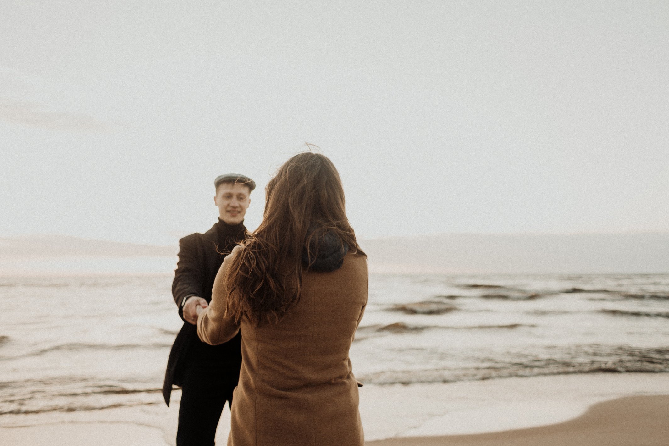 A Couple Dancing on a Beach